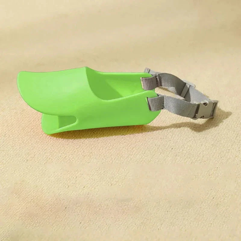 Soft, lightweight, and flexible silicone dog muzzle with a cute duck-bill design for preventing barking, biting, and licking in small to medium-sized dogs