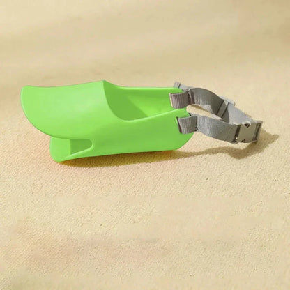 Soft, lightweight, and flexible silicone dog muzzle with a cute duck-bill design for preventing barking, biting, and licking in small to medium-sized dogs