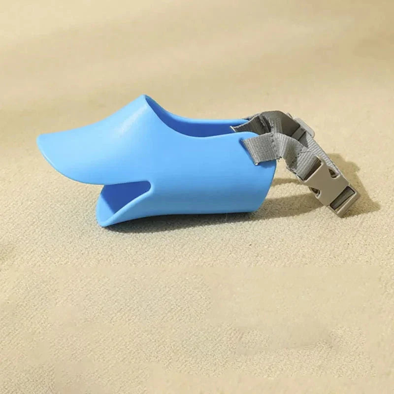 Soft, lightweight, and flexible silicone dog muzzle with a cute duck-bill design for preventing barking, biting, and licking in small to medium-sized dogs