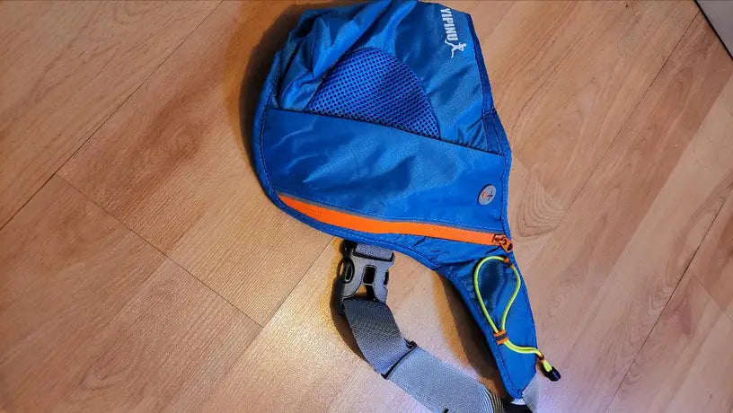 Running Water Bottle Waist Pack with adjustable strap, water bottle holder, and reflective safety features
