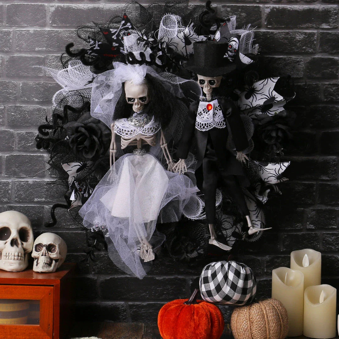 Spooky Halloween decoration featuring a mesh garland with a bride and groom skull design