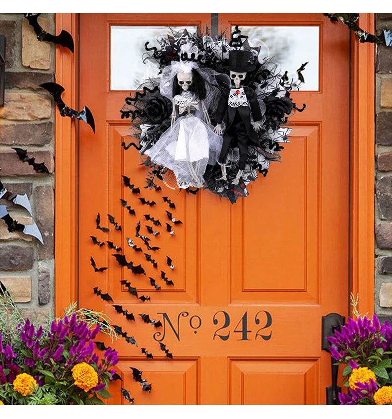 Spooky Halloween decoration featuring a mesh garland with a bride and groom skull design