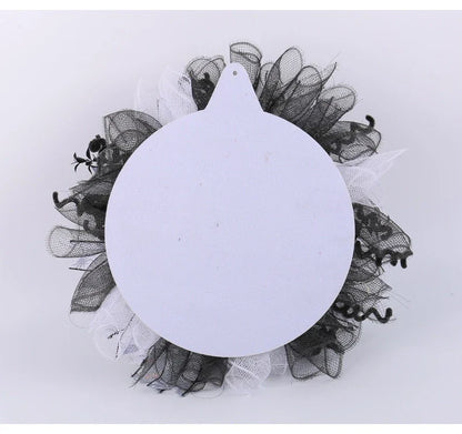 Spooky Halloween decoration featuring a mesh garland with a bride and groom skull design