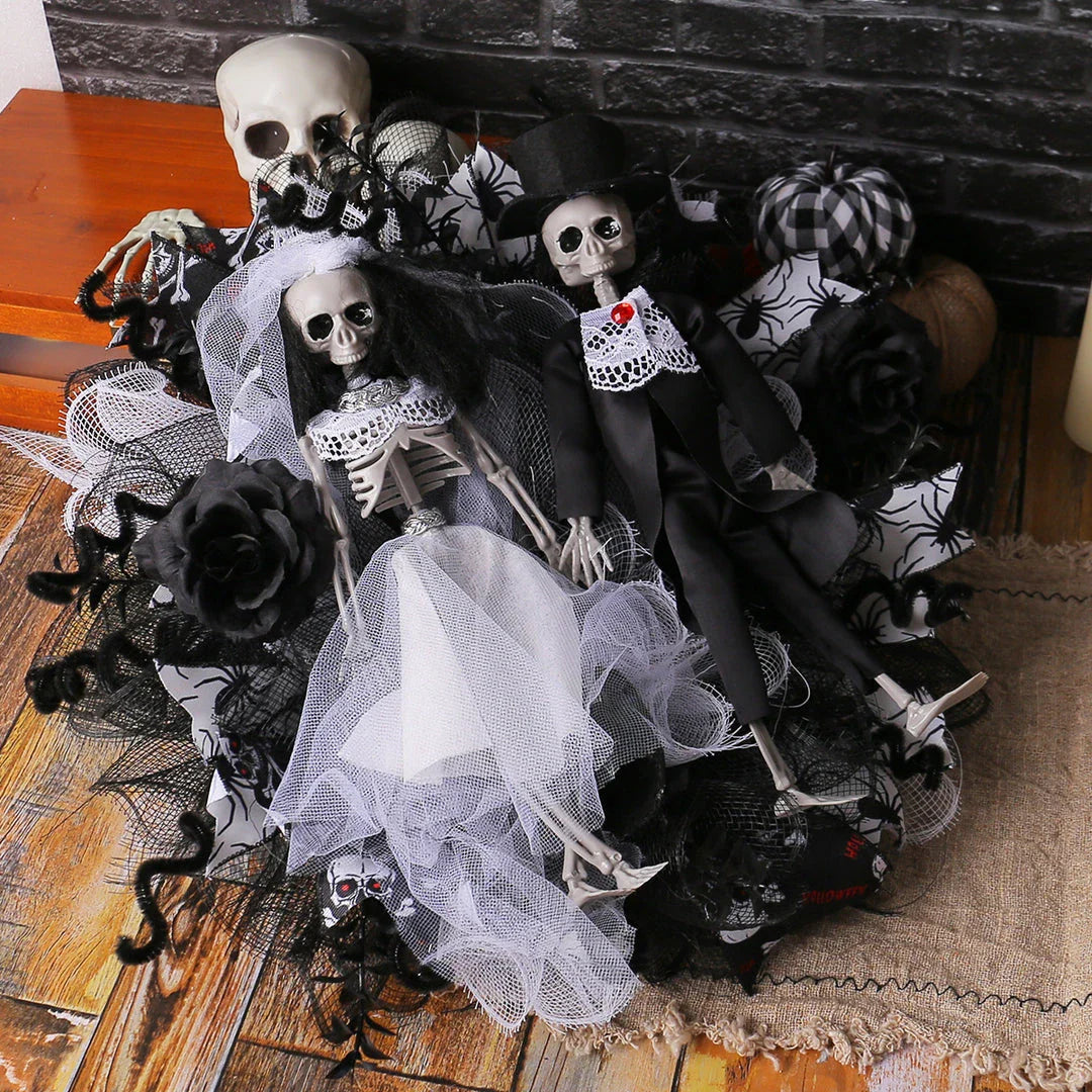 Spooky Halloween decoration featuring a mesh garland with a bride and groom skull design