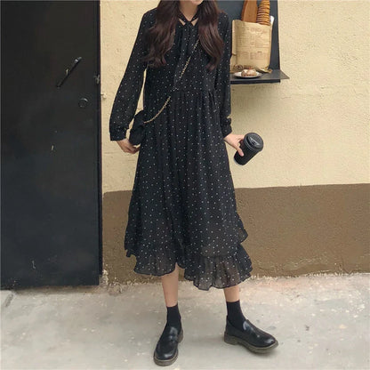 Chiffon loose sweet wave dot dress with a relaxed fit and midi-length skirt, featuring a delicate wave pattern and polka dot design