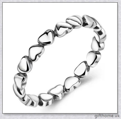 Elegant 925 sterling silver heart-shaped ring with a lustrous finish, perfect for any occasion