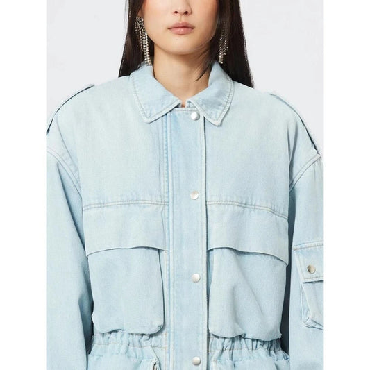 Model wearing a stylish patchwork denim jacket with practical pockets and a refined collar design