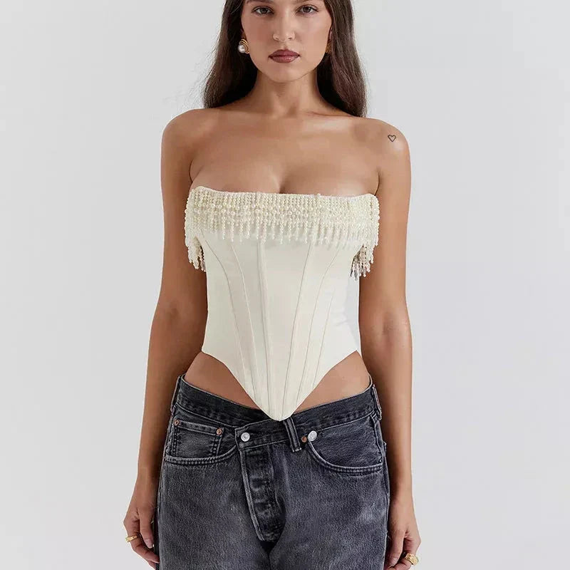 Chic strapless corset top with beaded and tassel details, made from high-quality synthetic fibres for a flattering and comfortable fit.