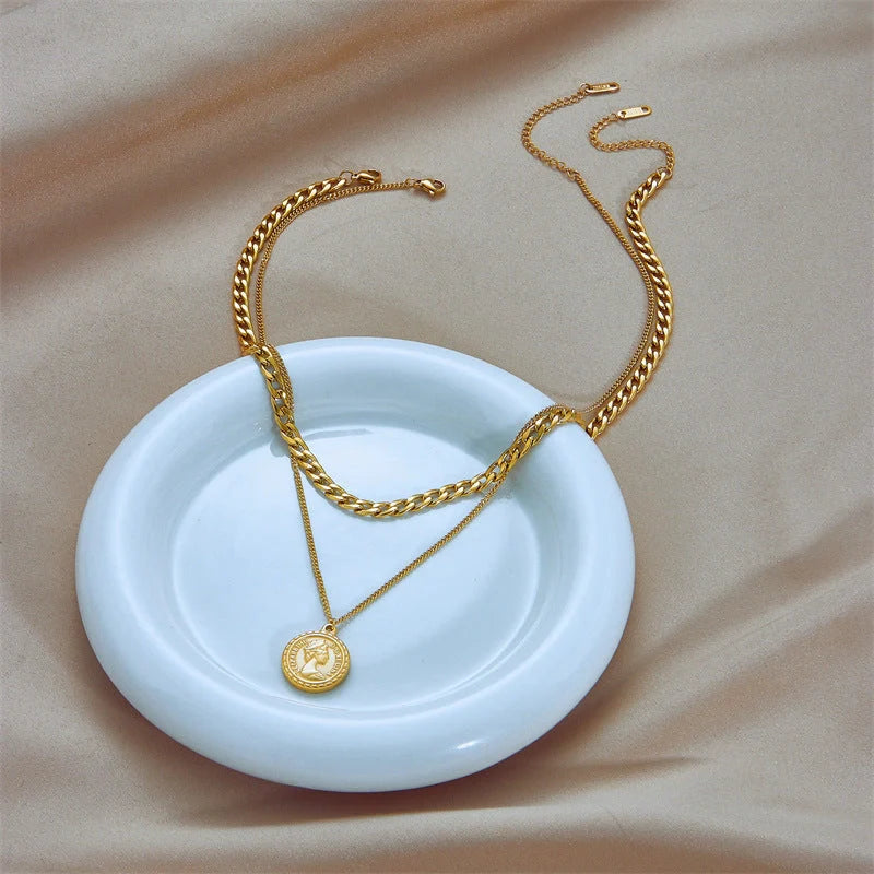 Geometric coin pendant necklace made of premium titanium steel, featuring a stylish and versatile design for women