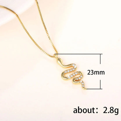 Snake pendant necklace with zirconia stones in white gold and gold finishes