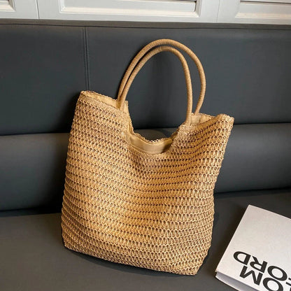 A stylish and spacious straw tote bag in brown and beige colours, perfect for British women on the go.