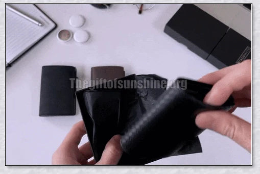 A sleek and modern leather wallet with a built-in aluminium card holder and AirTag compatibility for secure storage and easy tracking.
