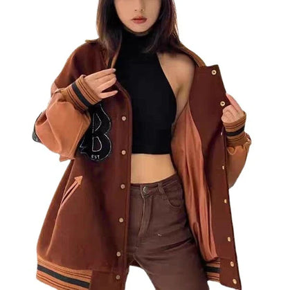 Men's and Women's Loose Minority Design Coat in black, featuring a sophisticated colour blocking design and a generously loose fit for elevated style.