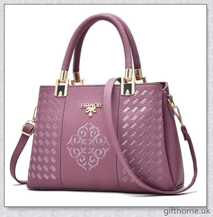 A stylish diagonal handbag made from high-quality PU leather, featuring a spacious interior, adjustable shoulder strap, and organised compartments.
