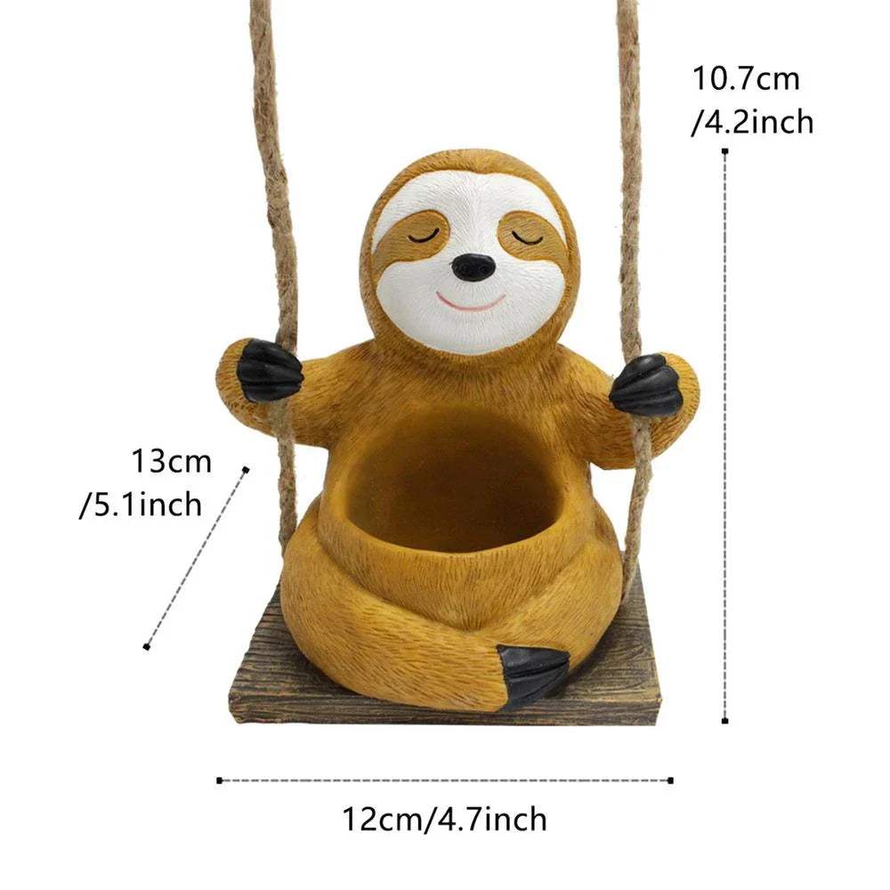 Charming swing sloth planter made of high-quality resin, perfect for adding greenery and whimsy to home and garden decor.