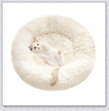 Round and raised cat marshmallow bed in white and grey colours, designed to promote healthy and restful sleep for cats