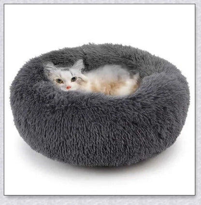 Round and raised cat marshmallow bed in white and grey colours, designed to promote healthy and restful sleep for cats