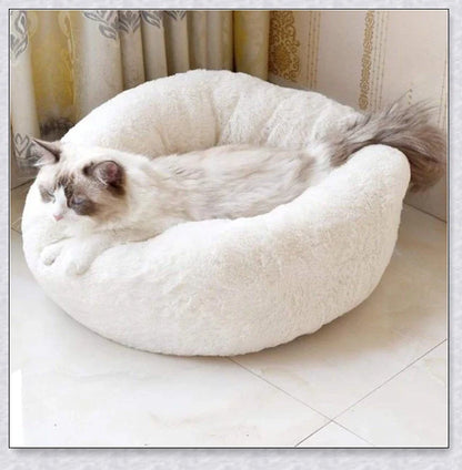 Round and raised cat marshmallow bed in white and grey colours, designed to promote healthy and restful sleep for cats