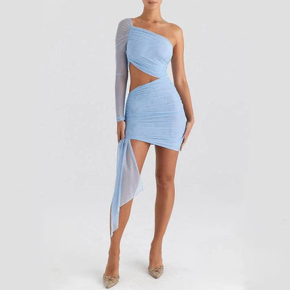 Chic backless mini dress with mesh overlay, showcasing a unique inclined shoulder design and flattering silhouette