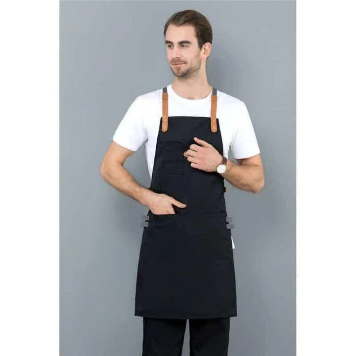 A long denim apron with a matching cooking hat, designed to provide a professional and stylish look for home cooking and baking enthusiasts.