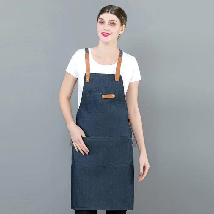 A long denim apron with a matching cooking hat, designed to provide a professional and stylish look for home cooking and baking enthusiasts.