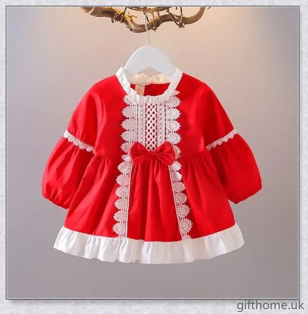 A cosy and stylish autumn lace Christmas dress for baby girls, available in a range of festive colours.