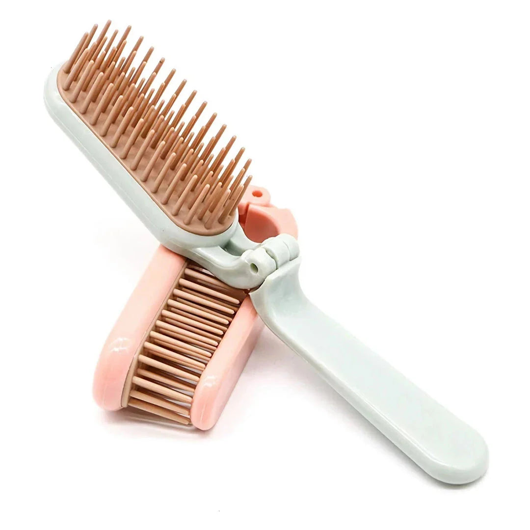 Compact, foldable hair brush with built-in scalp massager for convenient hair care on the go