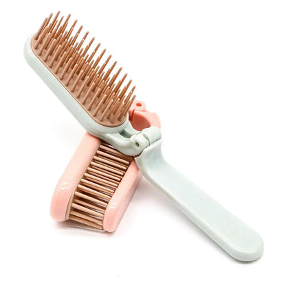 Compact, foldable hair brush with built-in scalp massager for convenient hair care on the go