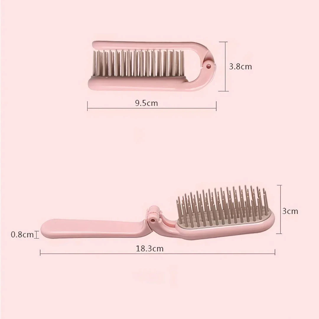 Compact, foldable hair brush with built-in scalp massager for convenient hair care on the go