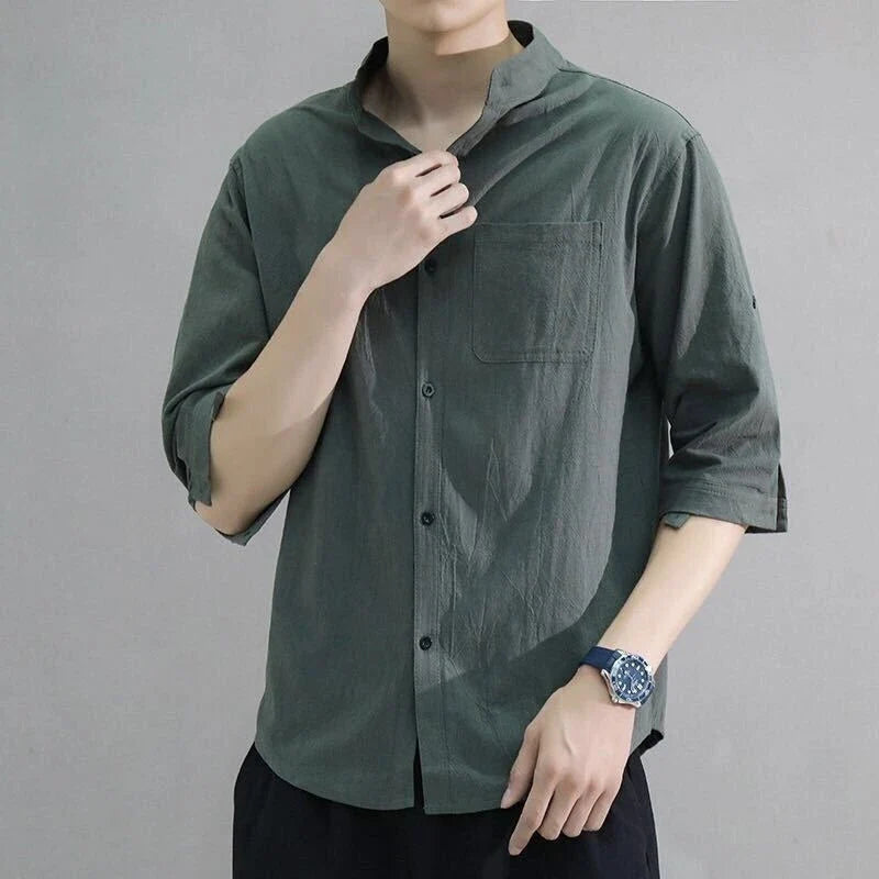 Premium cotton and linen men's short-sleeved shirt in white, black, and green colours, featuring a tailored design and breathable fabric