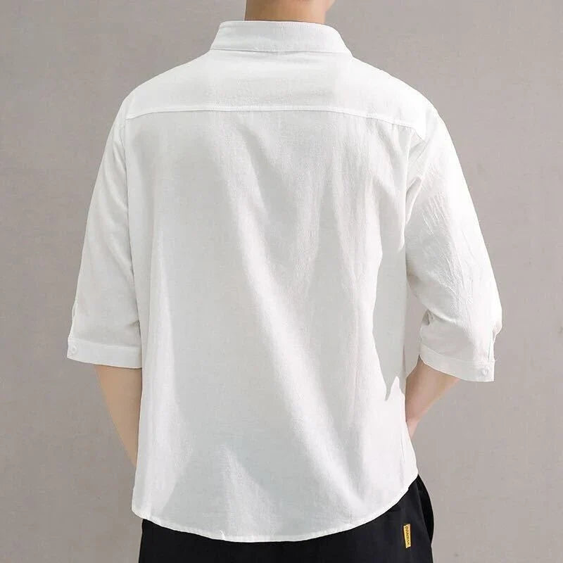 Premium cotton and linen men's short-sleeved shirt in white, black, and green colours, featuring a tailored design and breathable fabric