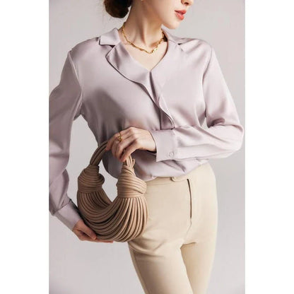 Elegant ruffled v-neck silk blouse in a champagne colour, featuring a straight and regular fit design for a timeless look.