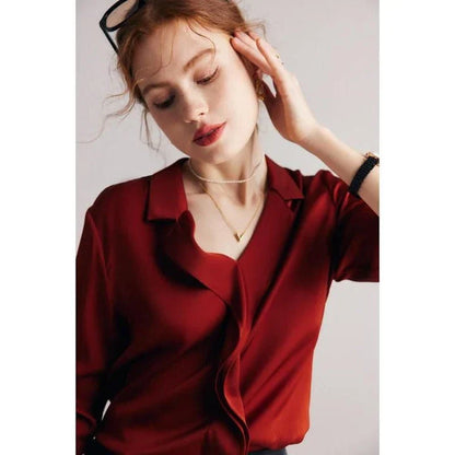 Elegant ruffled v-neck silk blouse in a champagne colour, featuring a straight and regular fit design for a timeless look.