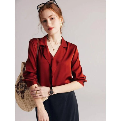 Elegant ruffled v-neck silk blouse in a champagne colour, featuring a straight and regular fit design for a timeless look.