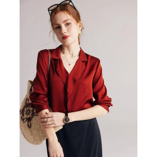 Elegant ruffled v-neck silk blouse in a champagne colour, featuring a straight and regular fit design for a timeless look.
