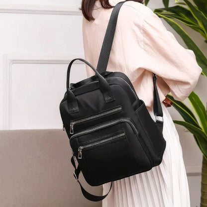 New Oxford Cloth Backpack in Dark Blue, a stylish and durable backpack with multiple compartments and a lightweight design