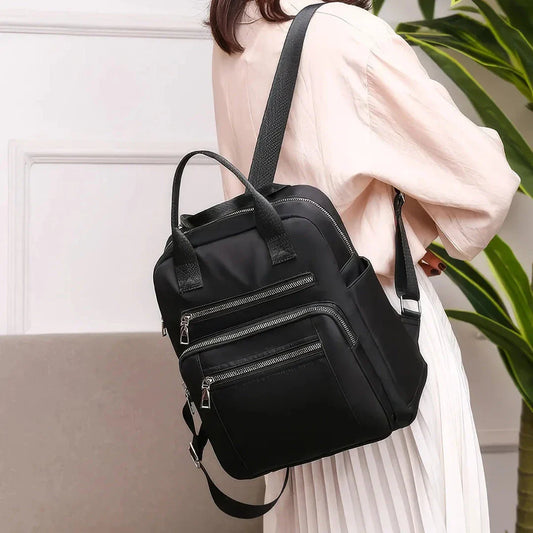 New Oxford Cloth Backpack in Dark Blue, a stylish and durable backpack with multiple compartments and a lightweight design