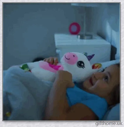Bellydreams Stuffed Animal Night Light - A plush, glowing companion that projects stars on the ceiling to help children sleep