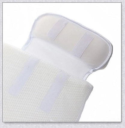 Newborn baby sleep pillow with fixed position and anti-roll support, designed for comfort and breathability