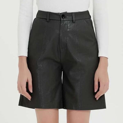 Elegant knee-length PU leather shorts for women in gray, featuring a regular fit design with a mid-rise waist and elastic waistband for maximum comfort and style.