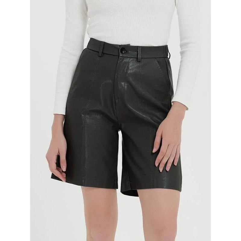 Elegant knee-length PU leather shorts for women in gray, featuring a regular fit design with a mid-rise waist and elastic waistband for maximum comfort and style.