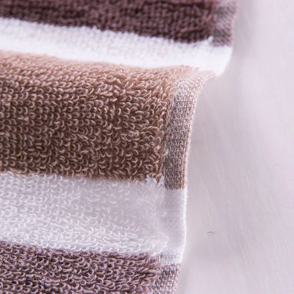 Luxurious cotton bath and face towel with brown, white, and blue striped design