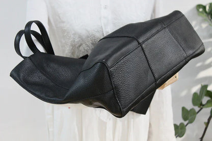 Premium cowhide leather handbag in a vintage-inspired design, featuring a spacious interior and multiple compartments for excellent organisation.