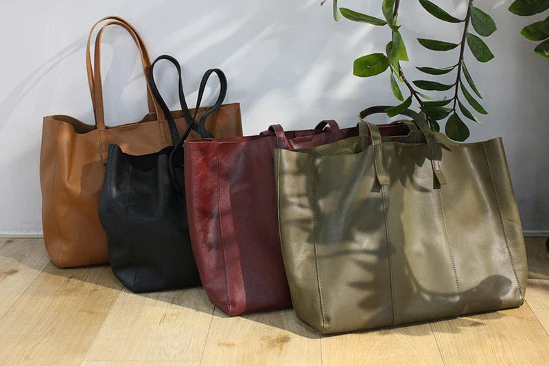 Premium cowhide leather handbag in a vintage-inspired design, featuring a spacious interior and multiple compartments for excellent organisation.