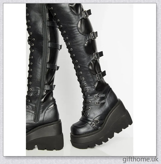 Stylish high platform thigh-high boots with fashionable buckle detailing, perfect for adding a touch of punk-inspired elegance to your outfit.