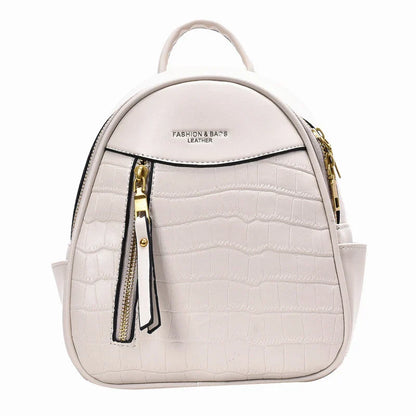 A chic and versatile all-match fashion small backpack in khaki, featuring a spacious square vertical design, premium PU leather construction, and polyester cotton lining for a timeless British-inspired look.