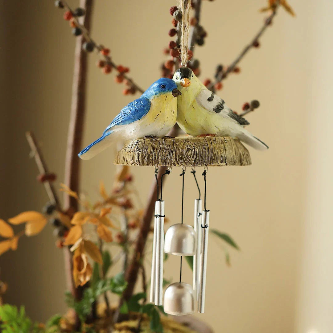 A charming wind chime featuring a beautiful array of resin birds that sways gracefully in the breeze, bringing a serene and whimsical touch to any outdoor or indoor space.