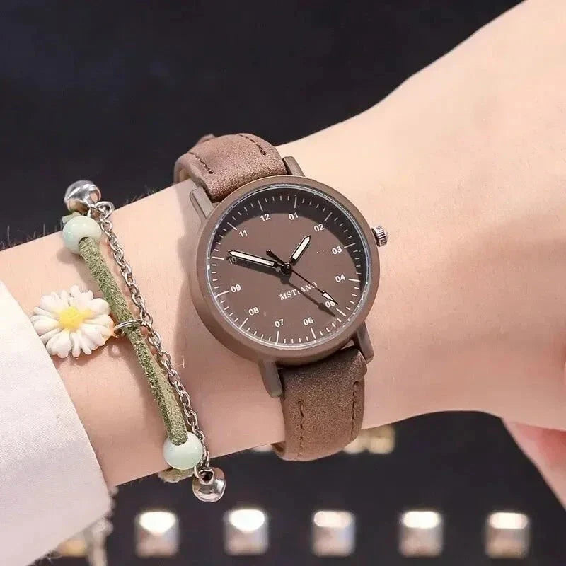 Luxury quartz women's watch with blue vegan leather strap, showcasing elegant and waterproof design