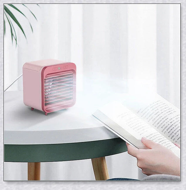 Rechargeable Mini Portable Air Conditioner with hydro-chill technology, providing rapid cooling and air purification for a comfortable, refreshed environment