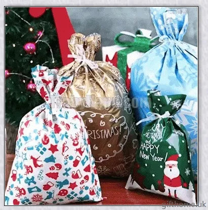 15 sets of drawstring Christmas gift bags in various sizes and festive designs
